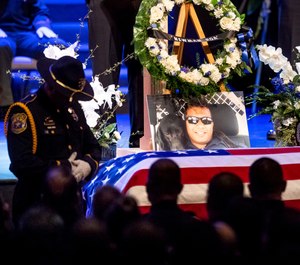 a picture of slain Newman Police Cpl. Ronil