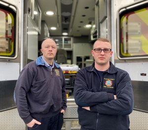 Maryland began using prehospital emergency medical clinicians paired with critical care physicians in its Critical Care Coordination Center in November 2020. Their mission: ensure the right patient receives the right service, at the right time and in the right place. Pictured are Paramedics and Critical Care Coordinators Jason Wolf and Joshua Bosley