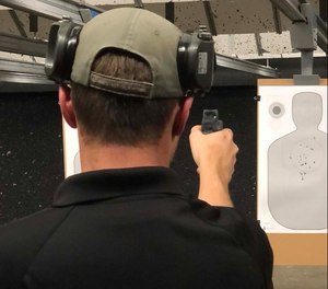 Instructor Joshua Anderkin demonstrates one-handed shooting with dry fire to see what is happening with the dot. Many times, your trigger pull will affect dot movement.