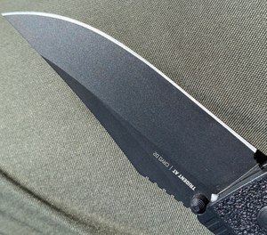 The blade is a clip point made of cryogenically treated D2.