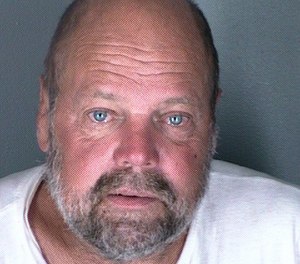 Mark Stephen Szyperek was arrested on suspicion of four counts of attempted first-degree assault with a deadly weapon, fourth-degree arson and possession of explosives, after reportedly throwing an improvised explosive at people outside a Boulder fire station.