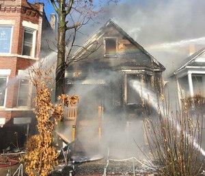 The fire broke out shortly before noon and was quickly raised to a 2-11 alarm, sending extra equipment and crews.
