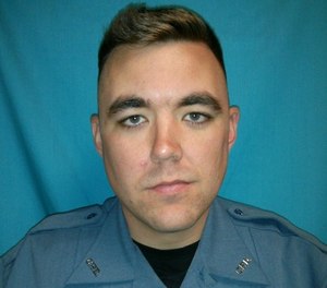This undated file photo released by Clinton Police Department shows officer Christopher Ryan Morton.