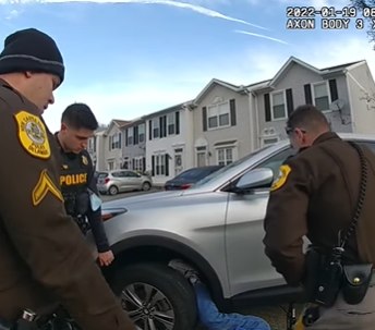 Watch: Del. police officers lift car off of woman's leg