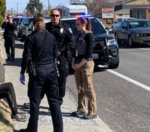 Deanna Petrilli and officers from the Kennewick Police Department at the scene where a citizen was exhibiting bizarre behavior and threats to harm himself. The citizen agreed to be transported to a mental health treatment facility.