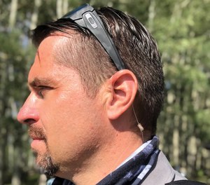 Deputy Siegert models the N-ear 360, which offers comfort, high-quality audio with a barely-visible profile.