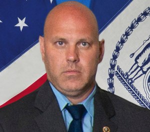 Det. Brian Simonsen is shown. New York Police Commissioner James O'Neill told the media during a news conference that Simonsen was shot and killed by friendly fire Tuesday night, Feb. 12, 2019, while responding to a report of an armed robbery at a T-Mobile store in the Richmond Hill section of Queens.