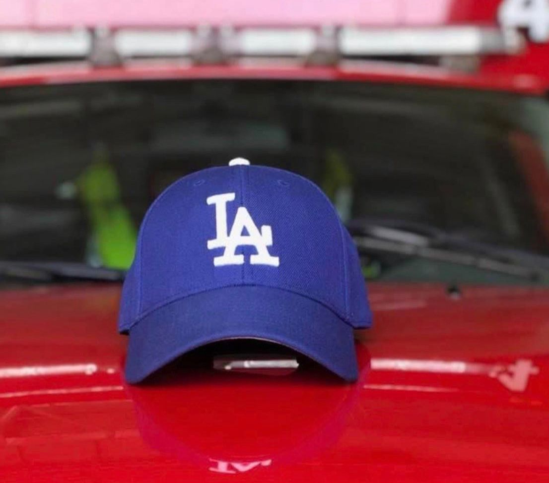 firefighters to wear Dodgers caps 