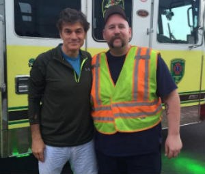 Dr. Mehmet Oz and FF/EMT Vincent Knott after Oz treated victims of a one-vehicle collision on the N.J. Turnpike on May 9