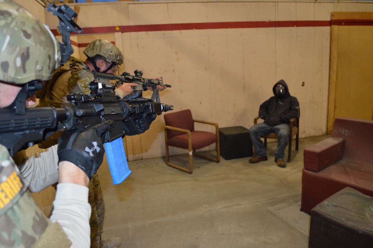SWAT team training for drug raid tactical entry