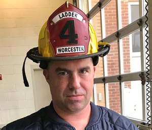 Worcester EMS paramedic Sean Doherty penned “December Mourn” to remember Worcester Fire Department firefighter Christopher Roy.