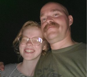 Durham and his daughter after being located by first responders.