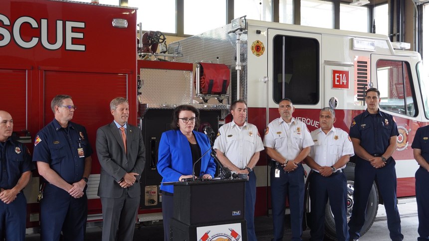 Maia Dalton-Theodore addresses the community from Albuquerque Fire Rescue Department on the day the new behavioral health director position is announced.