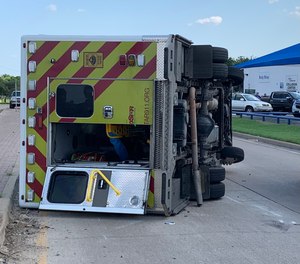 A MedStar unit was responding to an emergency call with its lights and sirens on when a car hit it in an intersection.