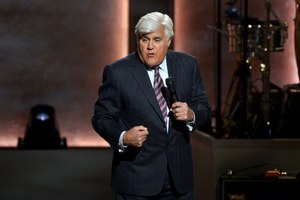 In this photo from March 4, 2020, Jay Leno performs at the Library of Congress Gershwin Prize tribute concert at DAR Constitution Hall in Washington, D.C. He was hospitalized with severe burn injuries for more than a week after a car in his garage reportedly caught fire.
