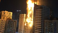 Massive fire burns residential tower in United Arab Emirates