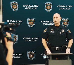 Ed Smith, Range Master and Training Officer for the O’Fallon Police Department in Missouri, addresses the media about active shooter response simulations for schools made with the department's VirTra immersive training simulator.