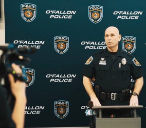 Ed Smith, Range Master and Training Officer for the O’Fallon Police Department in Missouri, addresses the media about active shooter response simulations for schools made with the department's VirTra immersive training simulator.