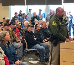 An overflowing crowd packs the Elko County Commission chamber as Elko County Sheriff Aitor Narvaiza presents his case for the county to declare a