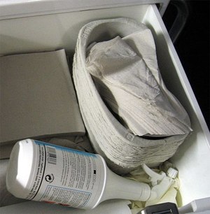 Stack of cardboard emesis basins.