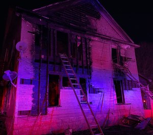 The cause and origin of the fire remain under investigation.