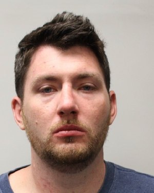 John Macintosh, 29, is accused of assaulting a firefighter who was responding to a call about another assault.