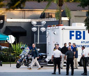 Law enforcement officials investigate shooting at Pulse nightclub. (AP Photo/David Goldman)