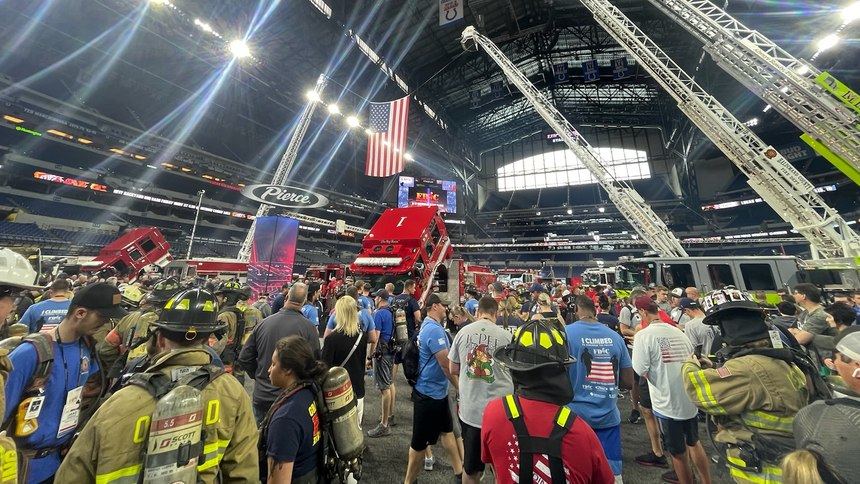 A crowd gathers as participants prepare for the 9/11 Memorial Stair Climb at Lucas Oil Stadium. 