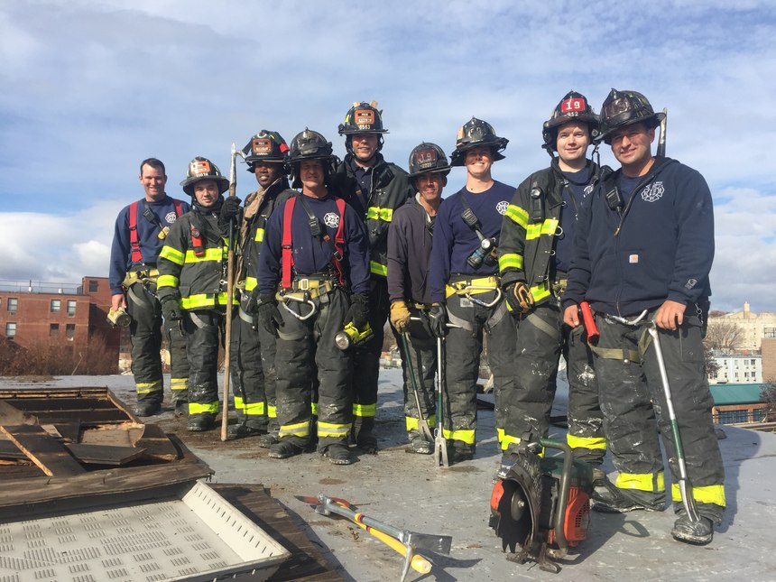 Members of FDNY Engine 50/Ladder 19 after drilling on roof operations.