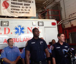 Rescue paramedics Niall O'Shaughnessy (right) and Moses Nelson recognized for saving a drowning woman in the Hudson River.