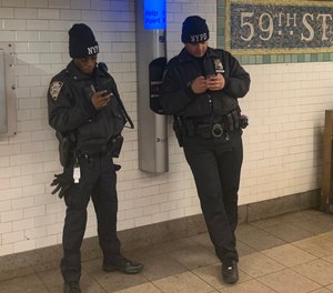 NYPD cops at a subway station on April 14, 2022, in New York .