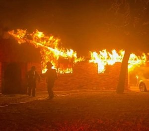 When they arrived, firefighters found heavy fire coming out of the front of the home. Crews also were told that several people were still trapped inside of the residence.