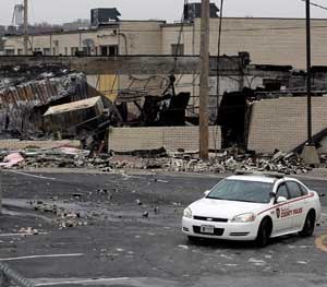 On West Florissant in Ferguson, buildings were burned to the ground when word came down that a grand jury would not indict Darren Wilson.