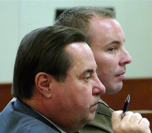 Defendant, Randall Kerrick, right, and his attorney George Laughrun listen to testimony during Kerrick's trial in Charlotte, N.C. Wednesday, Aug. 5, 2015. (AP Image)