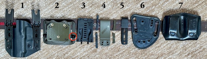 Figure 6: 1) Kydex holster with UltiClip XL, 2) G-Code standard universal belt slide with BWA circled, 3) Blade-Tech Tek-Lok with two snap-in BWA to the right, 4) G-Code belt loop with two reversible BWA to the right, 5) UltiClip 3+, 6) Safariland 567 adjustable belt loop and 7) A classic Gould and Goodrich double mag pouch.