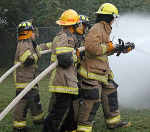 Evaluate team integrity, communication and progress while advancing the hose line to complete a primary search.