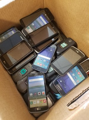 The use of cell phones, like these from a 2018 effort to intercept contraband cellphones, jeopardizes the safety of the public, staff and inmates.