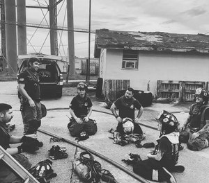 A crew engages in mask-up drill.