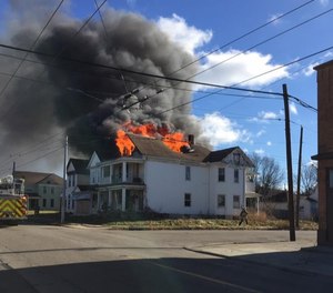 At this fire, an arriving staff officer performing a 360 noticed a sudden failure of a large roof section while the first-in crew was gearing up, and radioed the members about the collapse hazard.