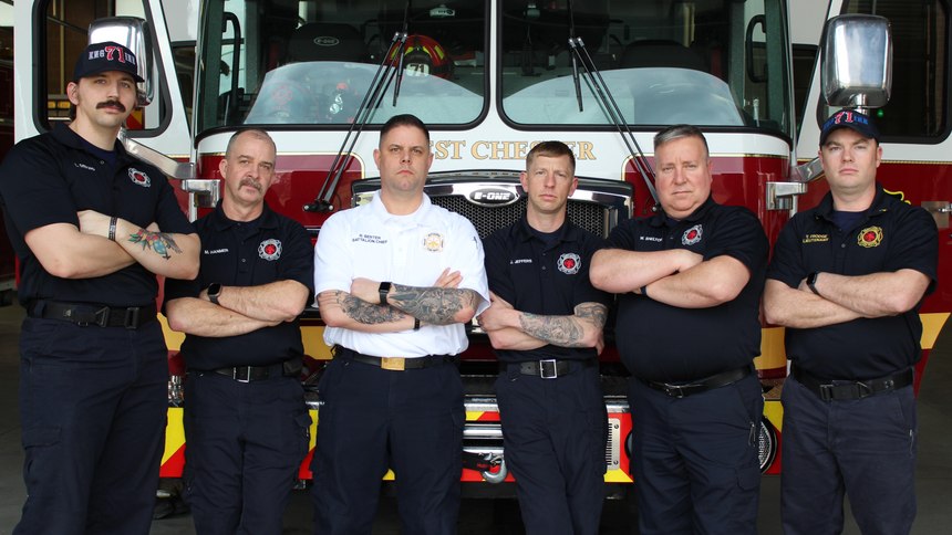 Fire Lt. Trevor Frodge (far right) stands with his crew.