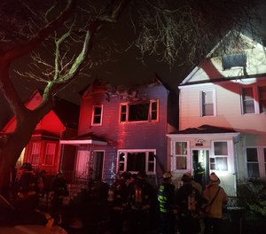 Chicago Firefighter Jermaine Pelt was working a hose line when the structure became unstable and crews were ordered to evacuate.