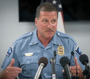Minneapolis Police Union President Lt. Bob Kroll speaks during a news conference in Minneapolis in July 2018.