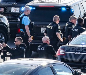 Marietta Police block southbound lanes on Interstate-75, near Marietta, Ga., North of Atlanta, Friday, March 29, 2019. (John Spink/Atlanta Journal and Constitution via AP)