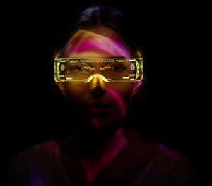 AR is a graphical interface with the real world that contains digital overlays that minimize cognitive load, allowing wearers to make better decisions.