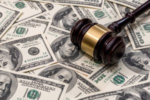 An employee claims that Cleveland County violated federal law and breached its contracts with employees by not paying them correctly for overtime work.