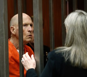Joseph James DeAngelo, suspected of being the Golden State Killer, talks with his attorney, Diane Howard, in Sacramento County Superior Court after prosecutors announced they will seek the death penalty if he is convicted in his case, Wednesday, April 10, 2019, in Sacramento, Calif.