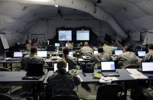 Members of the 2nd Brigade Combat Team, 82nd Airborne Division work in their Port-au-Prince command post as part of Operation Unified Response.