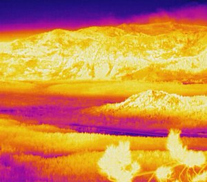 The thermal camera atop the Heavenly Mountain Resort at South Lake Tahoe, California gives firefighters the ability to see through thick smoke that otherwise keeps them from tracking fire progress directly ahead of the fire. The photo shows the view on Saturday, Aug. 28 at 6 a.m.