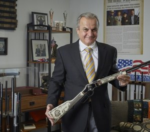 Henry Repeating Arms Founder and CEO Anthony Imperato displays a Henry American Eagle lever action rifle in the company’s Bayonne, New Jersey manufacturing plant. (Photo/Michael Ives)
