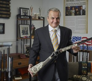 Henry Repeating Arms Founder and CEO Anthony Imperato displays a Henry American Eagle lever action rifle in the company’s Bayonne, New Jersey manufacturing plant. (Photo/Michael Ives)